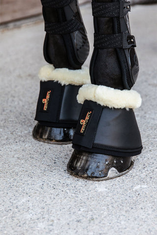 Bottes en cuir synthétique et peau de mouton artificielle Noir/Crème